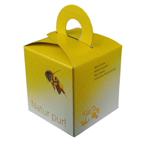Bündner Berghonig Geschenkbox – gelbe Verpackung mit Bienenmotiv, hochwertige Präsentverpackung für Schweizer Honig aus den Bergen.