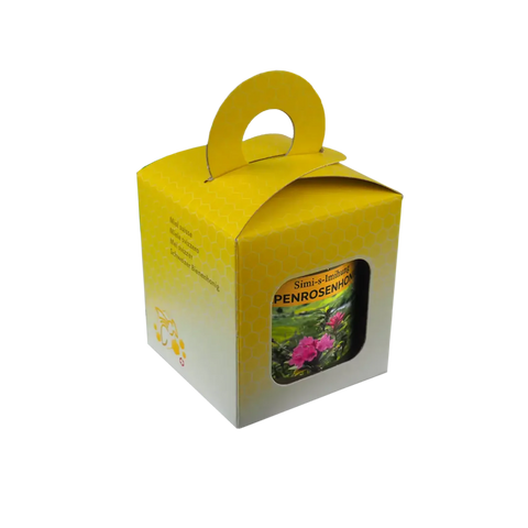 gelb-weiße Geschenkbox mit Sichtfenster und einem Alpenrosenhonig 250g seitliche Ansicht mit Tragegriff und Wabenmuster  und der aufschrifft Schweizer Bienenhonig