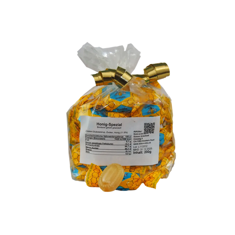 Transparenter Beutel mit honiggefüllten Bonbons, einzeln gewickelte Hartbonbons mit Honigkern und Produktetikett, 200 g Inhalt