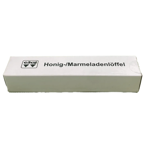 eine weiße Schachtel mit schwarzem Text Honig-/Marmeladenlöffel 
